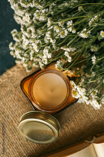 Candle, lemons and a book, summer mood