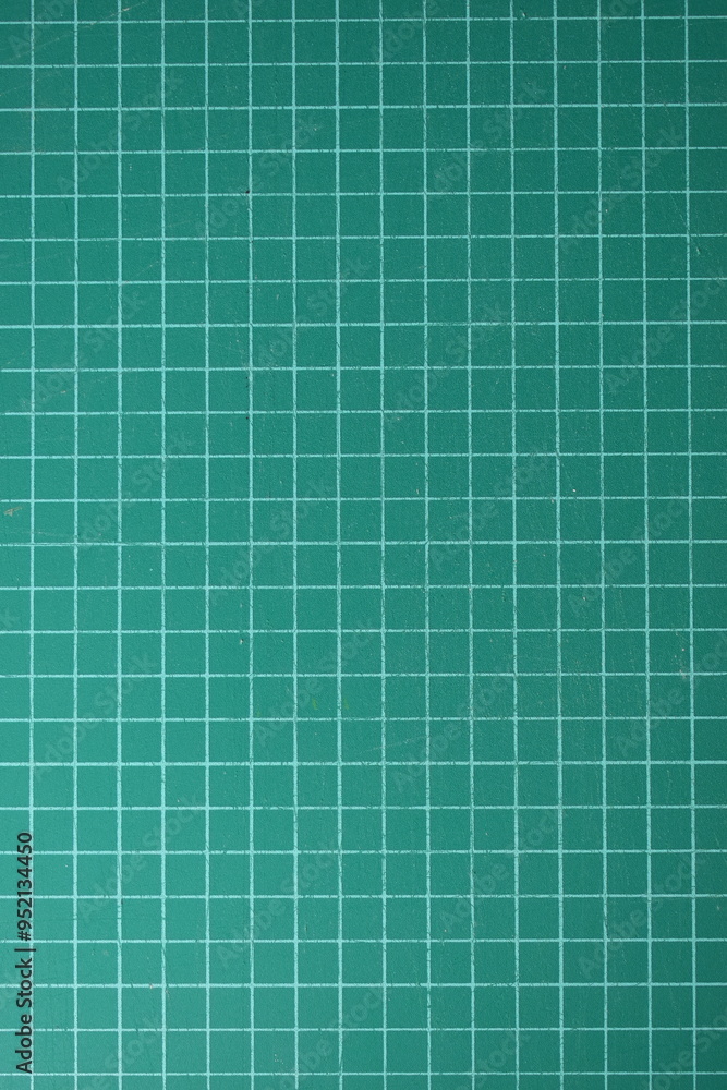 green cutting mat board background with line and scale measure guide pattern for object art design, tool equipment of diy craft work green cutting mat board background with line and scale measure guide pattern for object art design, tool equipment of diy craft work