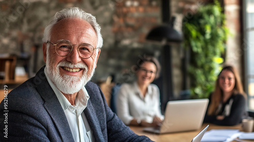 Happy senior man portrait and laptop with team