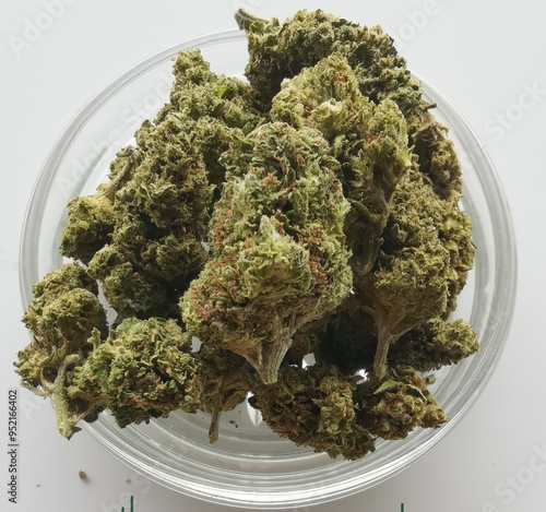 Marijuana buds storage. Medicinal cannabis flowering on white background, isolated. Hemp recreation, medical usage, legalization.