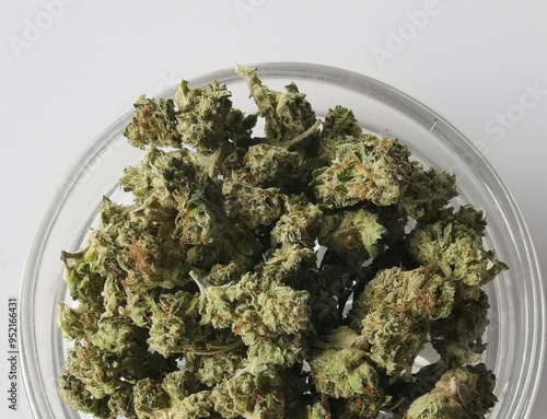 Marijuana buds storage. Medicinal cannabis flowering on white background, isolated. Hemp recreation, medical usage, legalization.