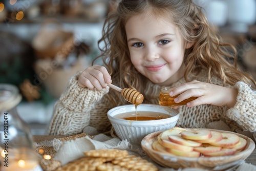 Jewish girl dipping apple slices into honey celebrating Rosh Hashanah! Traditional Jewish food, Rosh Hashanah apples in honey. Shana Tova, Happy Jewish New Year, Jewish holiday. Tishrei holidays