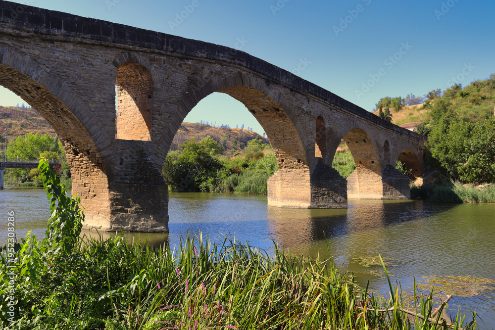 Romanesque bridge of Puente la Reina (11th century). It is one of the most interesting examples of civil architecture on the Camino de Santiago in Navarra. Romanesque bridge of Puente la Reina (11th century). It is one of the most interesting examples of civil architecture on the Camino de Santiago in Navarra.