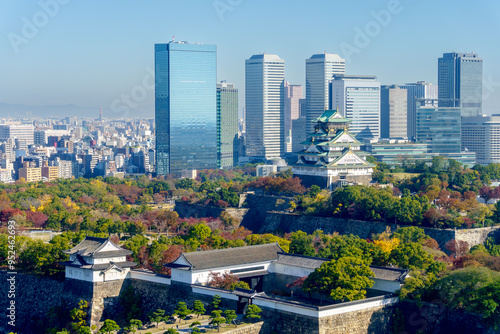 Colorful cityscape of Osaka city and Osaka castle in autumn season with clear blue sky background, Japan. Top view. Landmark of Osaka.