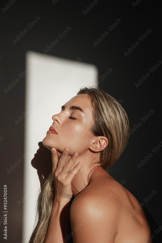 © blackday - Portrait of young woman with long blonde hair in sunlight © blackday - Portrait of young woman with long blonde hair in sunlight