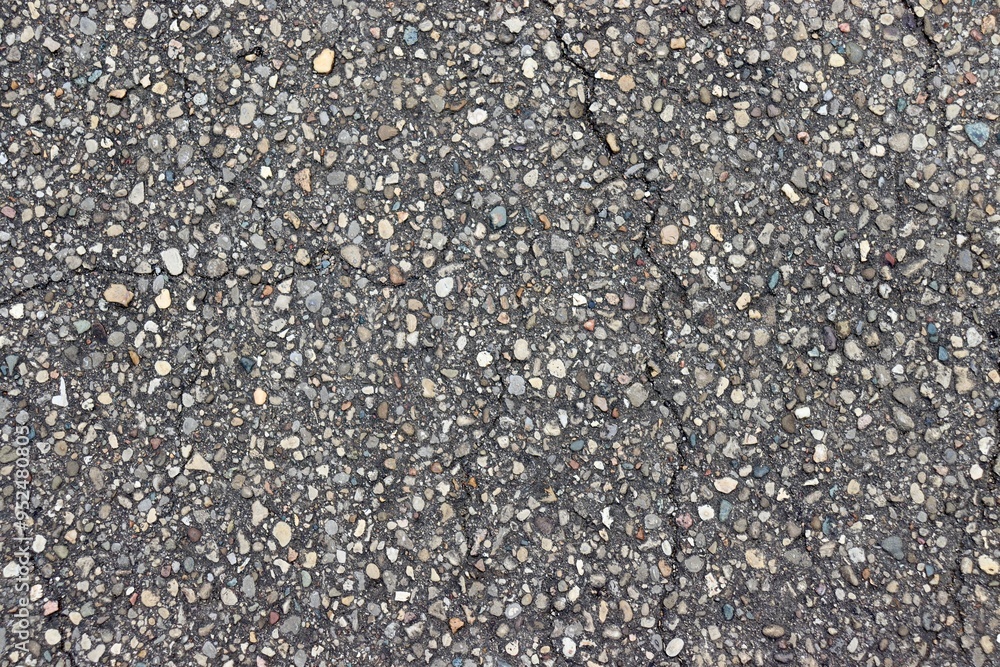 A close view of the black asphalt surface. A close view of the black asphalt surface.