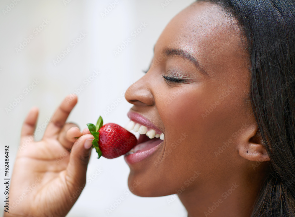 Black woman, health and strawberry bite in home, nutrition and organic fruits for wellness. Female person, profile and morning breakfast in kitchen, natural vegan diet and paleo food for weight loss Black woman, health and strawberry bite in home, nutrition and organic fruits for wellness. Female person, profile and morning breakfast in kitchen, natural vegan diet and paleo food for weight loss