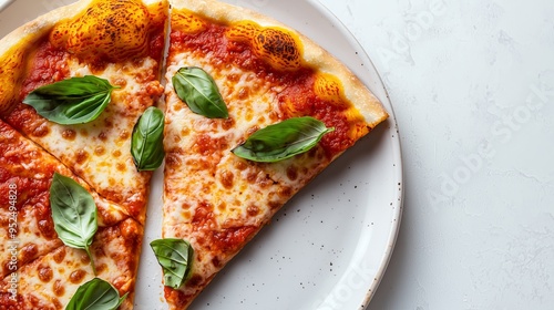 Top view of a single artisan pizza slice on a white ceramic plate. Features a crisp, golden crust with tomato sauce, melted mozzarella, and fresh basil. Light neutral background. photo