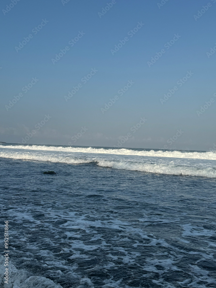 beachscape with wave and rock beachscape with wave and rock