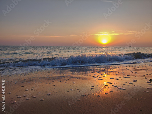 Beautiful reflex on the Mezzavalle beach in the summer season, Riviera del Conero, Marche region, Italy photo