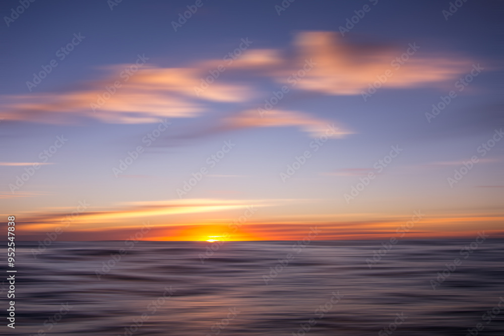 Fototapeta premium sunset sea and cloudscape with blurred sea