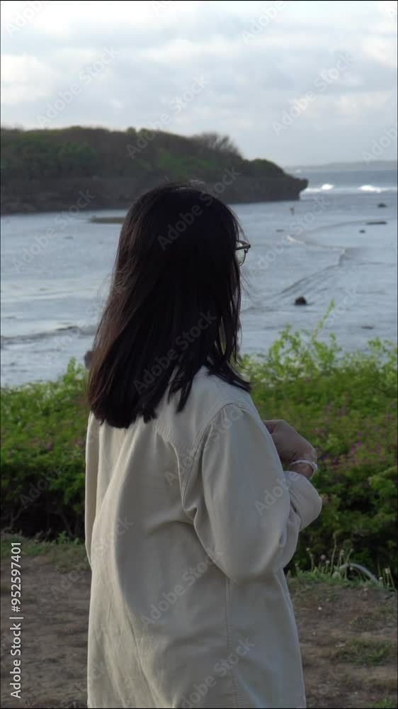 Contemplating the Ocean at Sunset