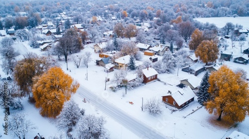 First snowfall of the season covering a small village winter weather