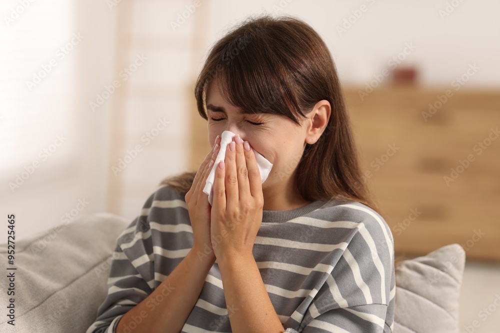 Woman with napkin suffering from sinusitis at home Woman with napkin suffering from sinusitis at home