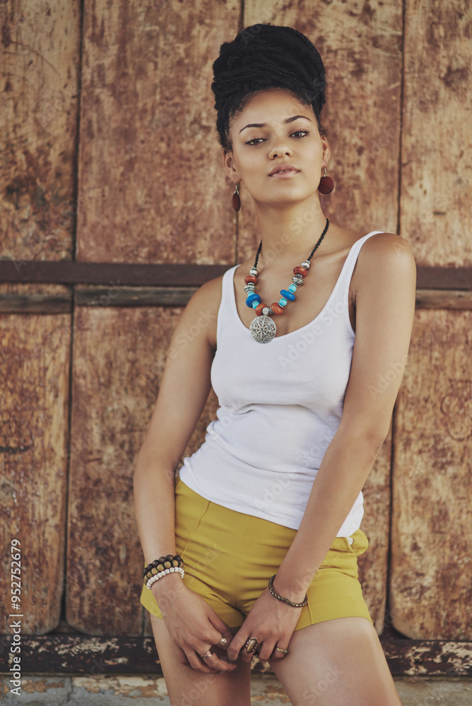Fashion, attitude and portrait of African woman with casual outfit, trendy clothes and cool accessories. Cosmetics, clothes and person with confidence, pride and beauty on brown background in city Fashion, attitude and portrait of African woman with casual outfit, trendy clothes and cool accessories. Cosmetics, clothes and person with confidence, pride and beauty on brown background in city