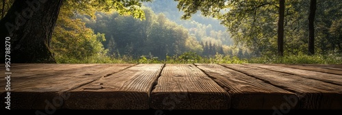 A weathered wooden table is placed outside, offering an inviting spot to enjoy the tranquility of a forest landscape illuminated by soft morning light