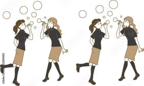 シャボン玉を飛ばすアミューズメントスタッフの女性