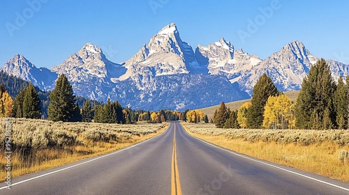 Driving through grand teton national park in fall, surrounded by colorful trees and majestic mountains, promises an unforgettable adventure in america's wilderness