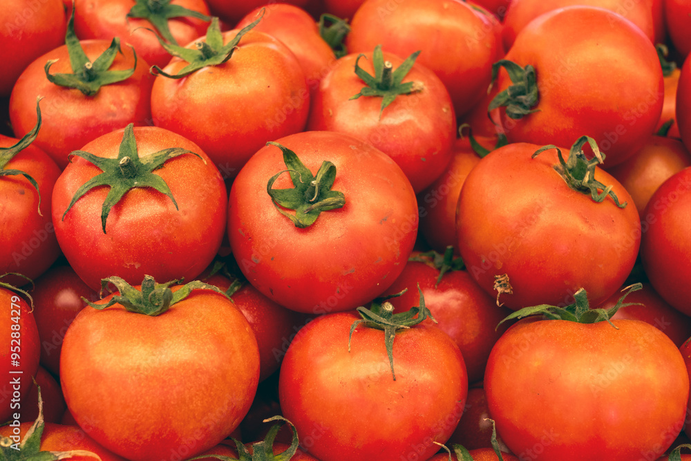 Fresh tomatoes on market stands Fresh tomatoes on market stands