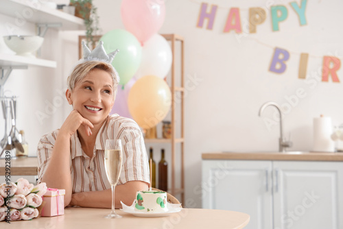 Mature woman celebrating he...