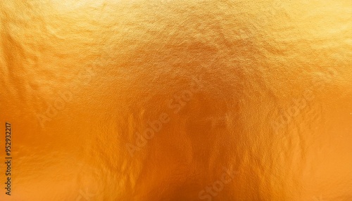 gold or orange foil texture background abstract gradient bright and shiny light reflection rough texture surface glass effect background