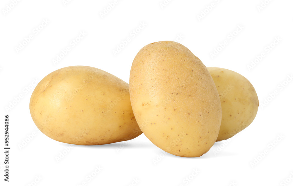 Three young fresh potatoes isolated on white Three young fresh potatoes isolated on white