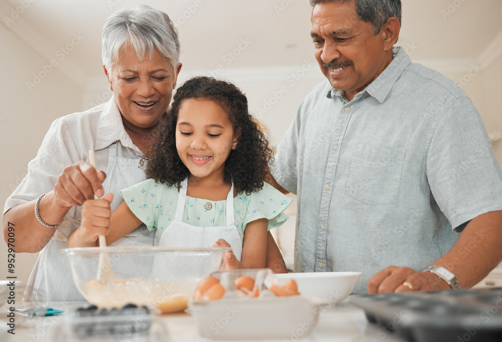 Mixing, child and grandparents with baking in kitchen for helping, learning and teaching cake recipe in home. Family, senior people and girl kid with raw ingredients for cooking education and support Mixing, child and grandparents with baking in kitchen for helping, learning and teaching cake recipe in home. Family, senior people and girl kid with raw ingredients for cooking education and support