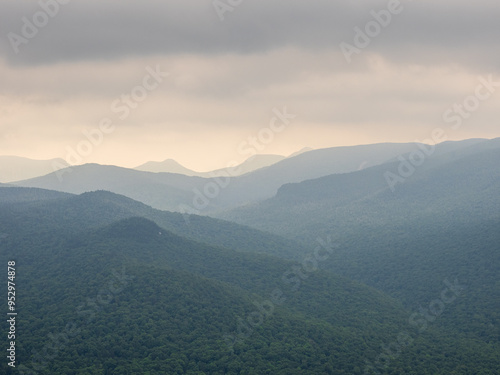 Adirondack Mountains layered in haze viewed from the summit of Mt. Van Hoevenberg, outside Lake Placid, New York State.