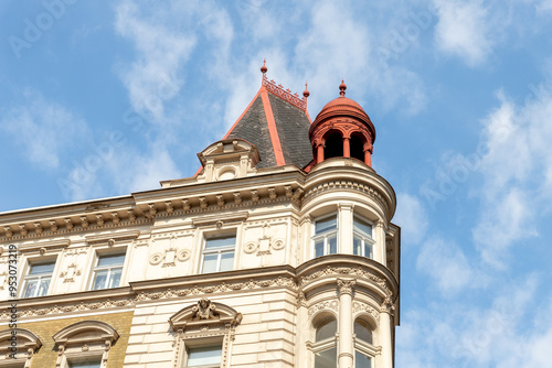 Decorative attic at the top of old building on Vodickova Street in the old part of the Prague in the Czech Republic photo