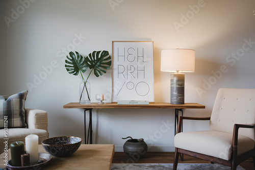 A photo of a living room with a modern decor. There is a wooden table with a white poster on it photo