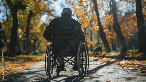 Wallpaper Mural Man in Wheelchair Enjoying Autumn Park Torontodigital.ca