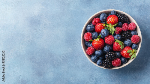 Juicy fresh berries in a bowl, glistening with freshness, vibrant colors, healthy and delicious