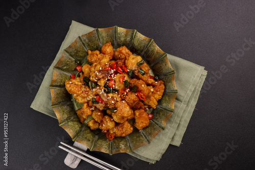 Kkanpunggi is Spicy Garlic Fried Chicken Stir Fried With Vegetables. photo