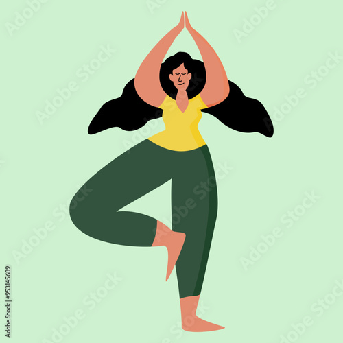 Young smiling woman doing yoga tree pose vrksasana, standing on one leg. Yoga, meditation and sport concept.
