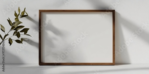 Blank Canvas Mockup: A minimalist home office desk with a blank canvas mockup, perfect for showcasing artwork, photography, or branding designs.