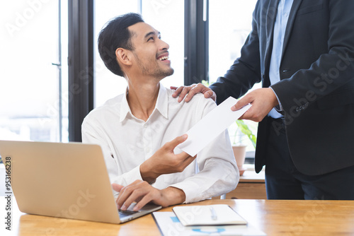 Canvas Print Good job Asian manager business man giving financial reward in an envelope, business letter extra salary to company employee, male worker office hand received premium bonus, getting cheque from boss