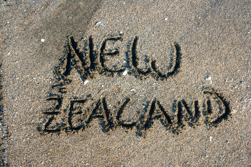 Fototapeta premium New Zealand inscription on the beach