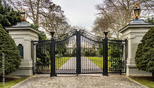 Iron gates entrance to palace, castle, mansion, trees, home, house, street, imposing, grand, historic, old, gate, fence