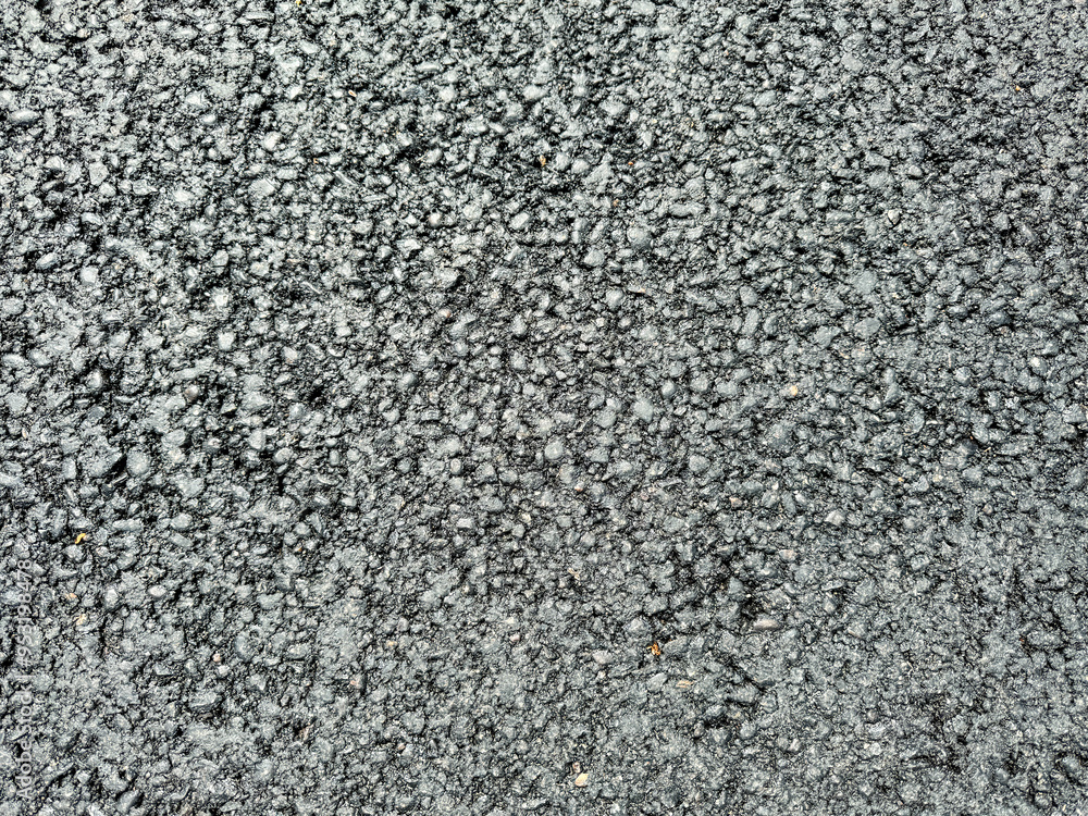 Black asphalt as an abstract background. Texture