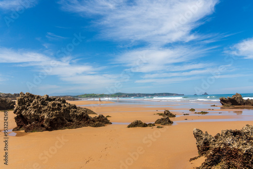 Canallave beach in Pielagos Cantabria Spain      orning of summer with low tide, Liencres dunes natural park. photo