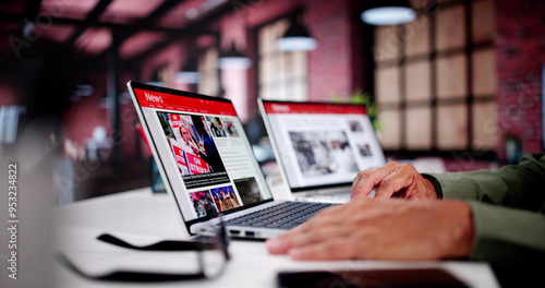 Papier peint Watching Online News Article On Mobile Phone And Laptop