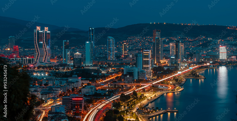Fototapeta premium View of Izmir Bay in the evening from the high hill of Bayrakli. Long exposure, low light.