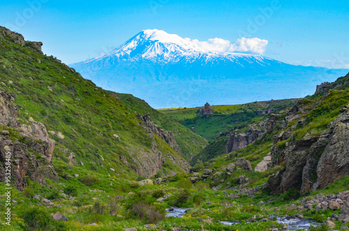 scenic view of Mount Ararat and Vahramashen Church in Amberd Fortress from Arkashen river valley (Aragatsotn province, Armenia)  photo