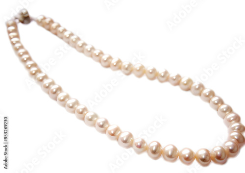 A classic white pearl necklace, showcasing the beauty and simplicity of this timeless gem.