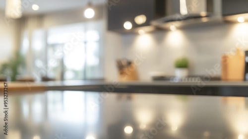 A blurred kitchen interior showcasing modern design elements and a clean, organized space.