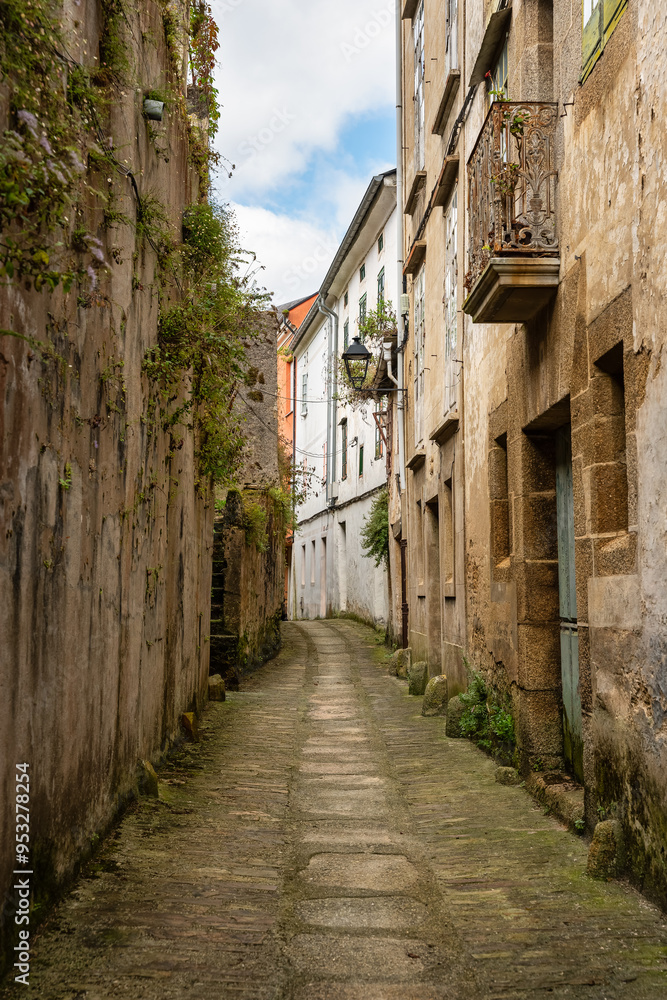 Narrow and picturesque streets with old houses in Mondonedo where pilgrims on the Camino de Santiago, Galicia. Narrow and picturesque streets with old houses in Mondonedo where pilgrims on the Camino de Santiago, Galicia.