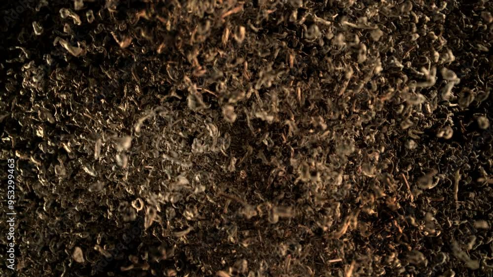 Super Slow Motion Shot of Dried Tea Flying and Rotating Towards Camera at 1000fps. Super Slow Motion Shot of Dried Tea Flying and Rotating Towards Camera at 1000fps.