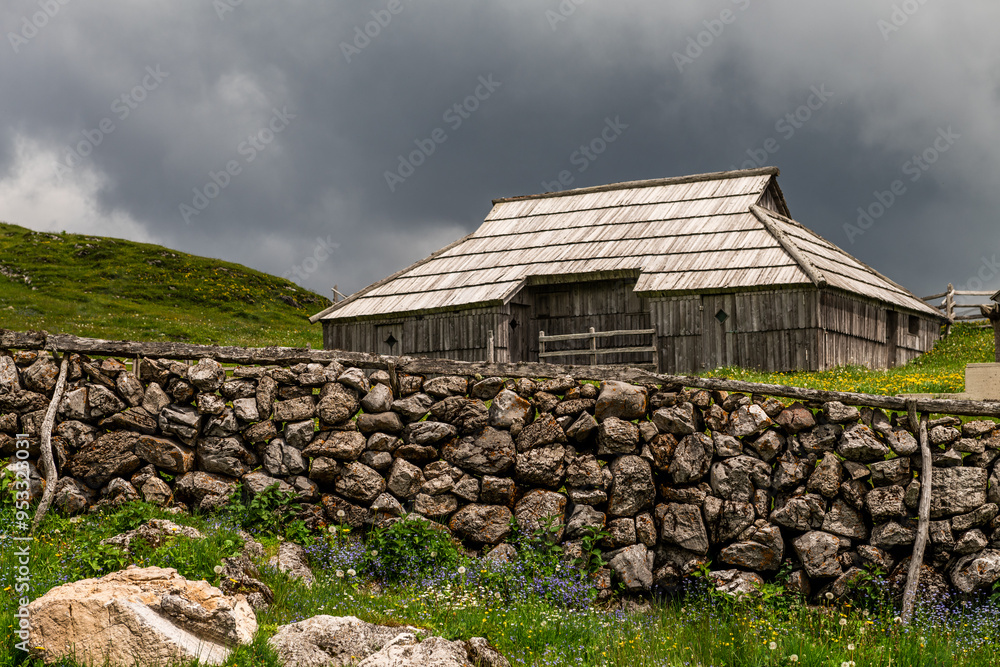 Velika Planina or Great plateau, Slovenia highlands with architecture of wooden huts and barns