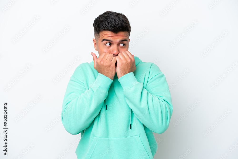 Young caucasian handsome man isolated on white background nervous and scared putting hands to mouth Young caucasian handsome man isolated on white background nervous and scared putting hands to mouth
