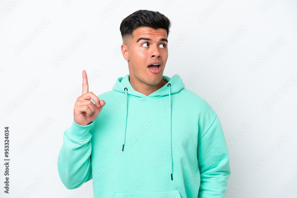 Young caucasian handsome man isolated on white background thinking an idea pointing the finger up Young caucasian handsome man isolated on white background thinking an idea pointing the finger up